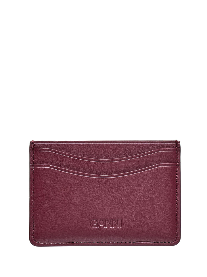 Ganni Bou Printed Card Holder in burgundy leather with Bou Bear forest illustration and pink butterfly resin hardware, front view - view 2