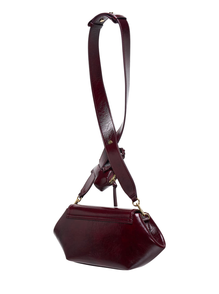 GANNI Bou East/West crossbody bag in glossy deep-burgundy with crossover strap, braided knot detail and attached mini zip pouch - view 2
