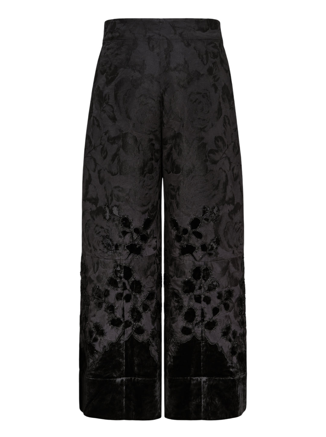 Biyan black lamé jacquard wide leg trousers with all-over rose brocade pattern, broderie anglaise cutwork floral hem border with beaded scallop edging, and velvet cuff finish, photographed flat on a white background - view 2