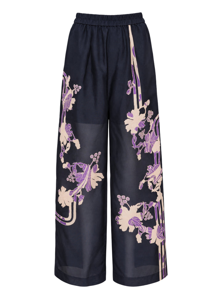 Biyan floral organza silk wide-leg pants in navy with blush and purple botanical print and elasticated waistband