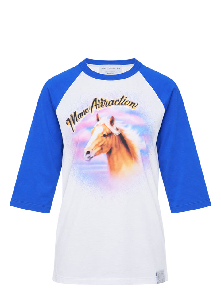 Stella McCartney Airbrush Horse Print Baseball Tee with 'Mane Attraction' script graphic on a white body and royal blue raglan three-quarter sleeves, shown flat on a white background