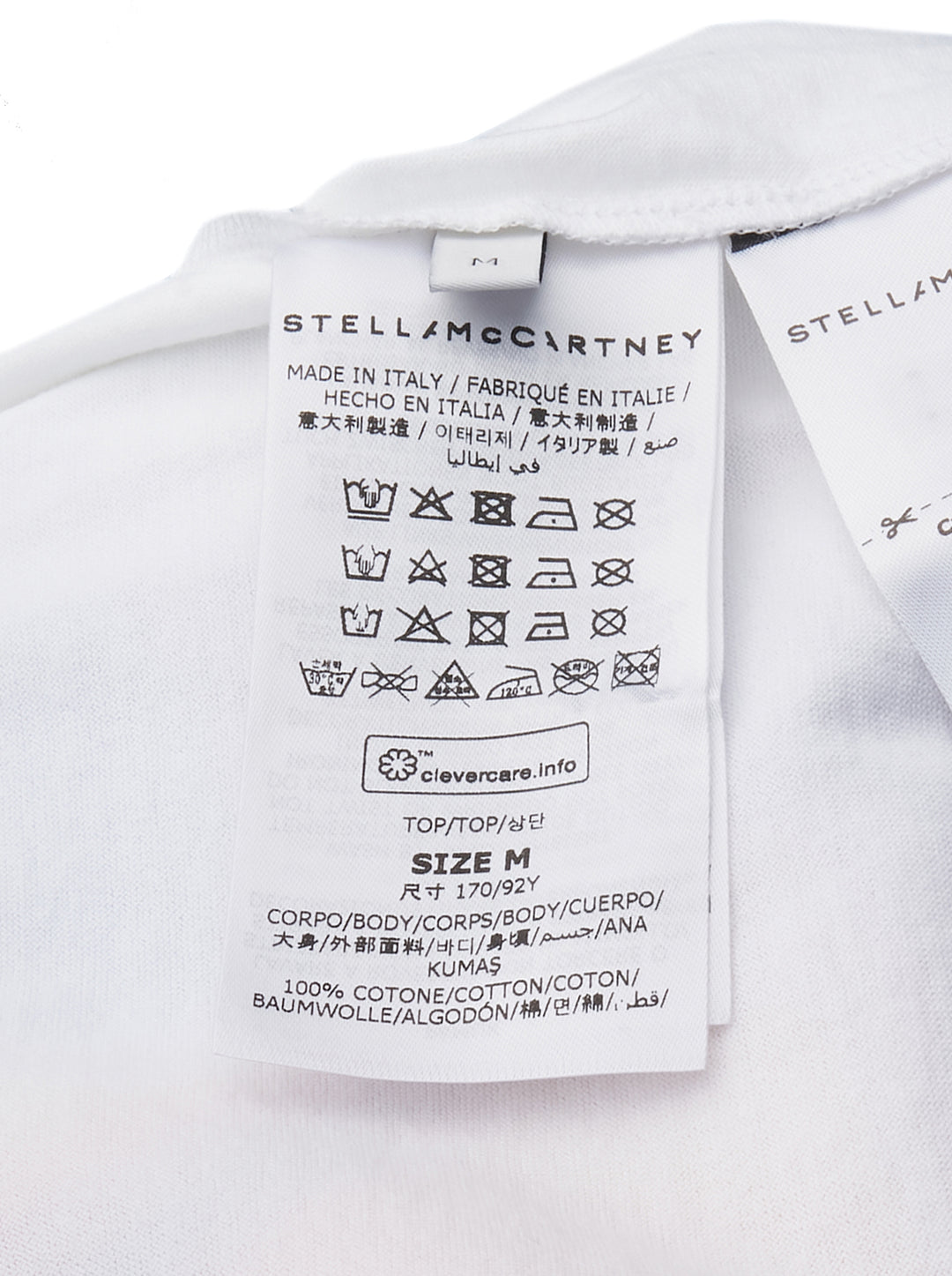Stella McCartney Airbrush Horse Print Baseball Tee with 'Mane Attraction' script graphic on a white body and royal blue raglan three-quarter sleeves, shown flat on a white background - view 3