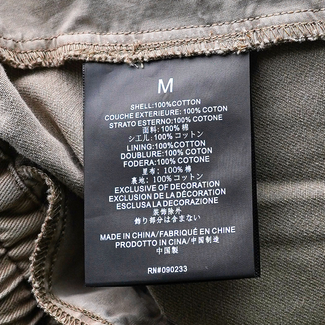 Fear of God Essentials Lounge Drawstring Shorts in garment-washed taupe with elasticated waistband, rope drawstring, and tonal logo embroidery - view 3
