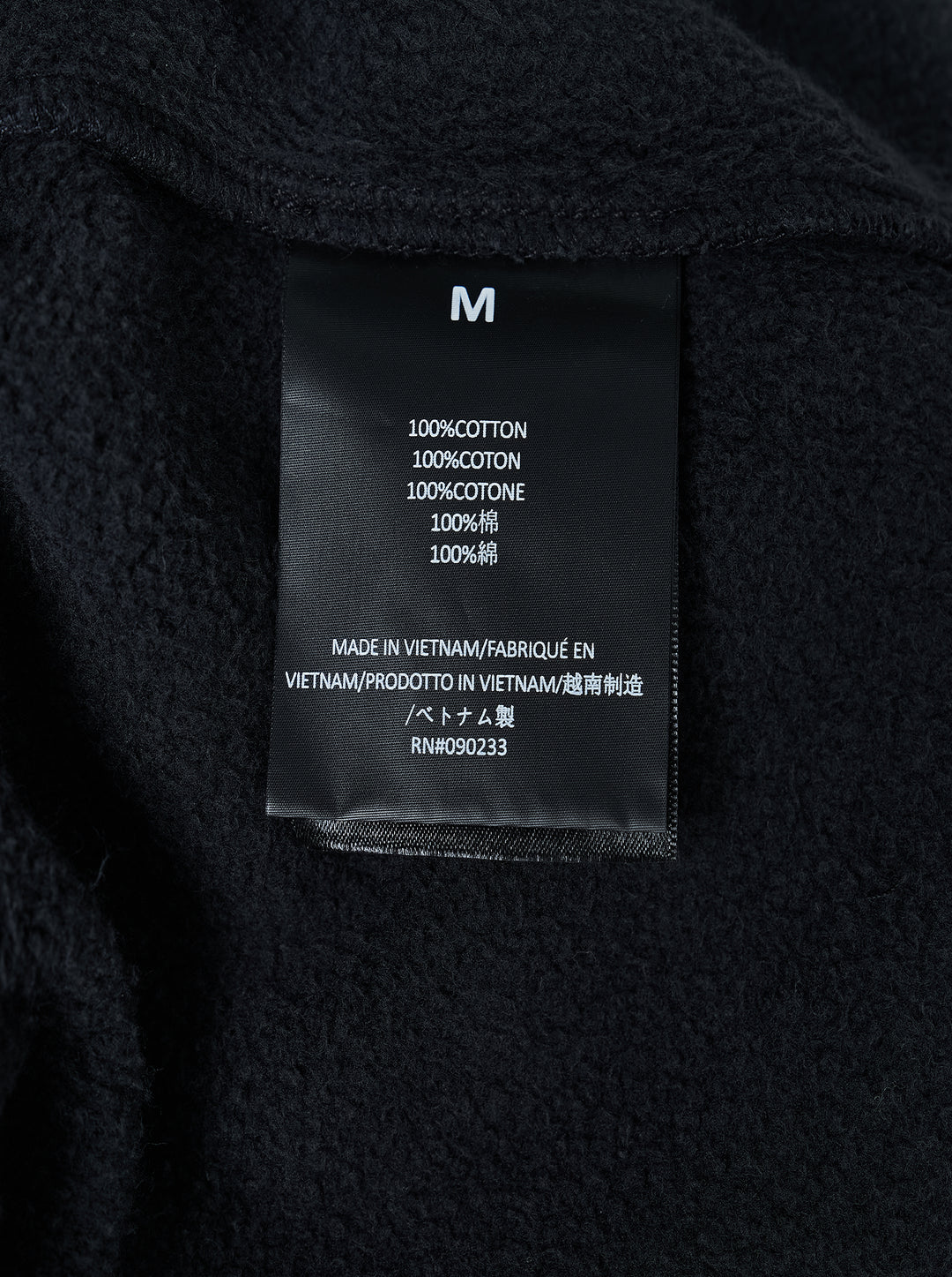 Fear of God Essentials washed black fleece shorts with drawstring waist and beige 'fog' logo print at the hem - view 3