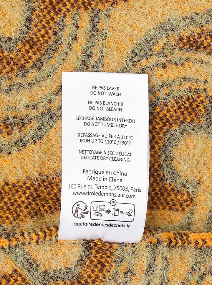 Drôle de Monsieur Mirror Abstrait Cardigan with all-over amber and sage swirl jacquard pattern, deep V-neck, burgundy ribbed trims, and horn-effect button fastening - view 5