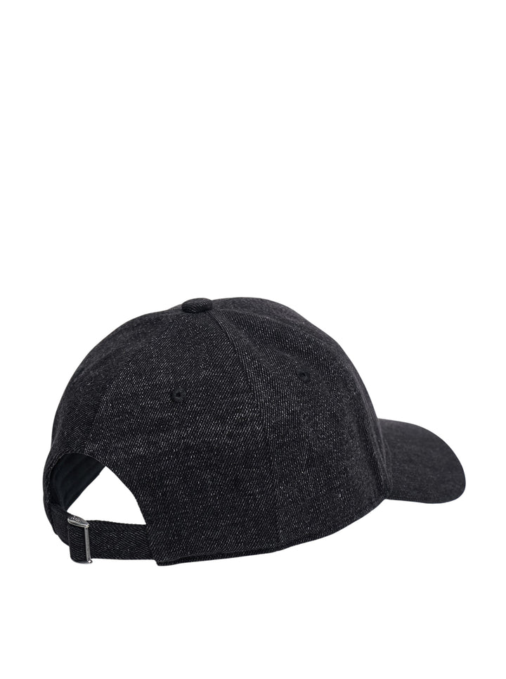 Drôle de Monsieur dark indigo denim baseball cap with gold embroidered script logo and swoosh detail on the front panel, front view - view 2