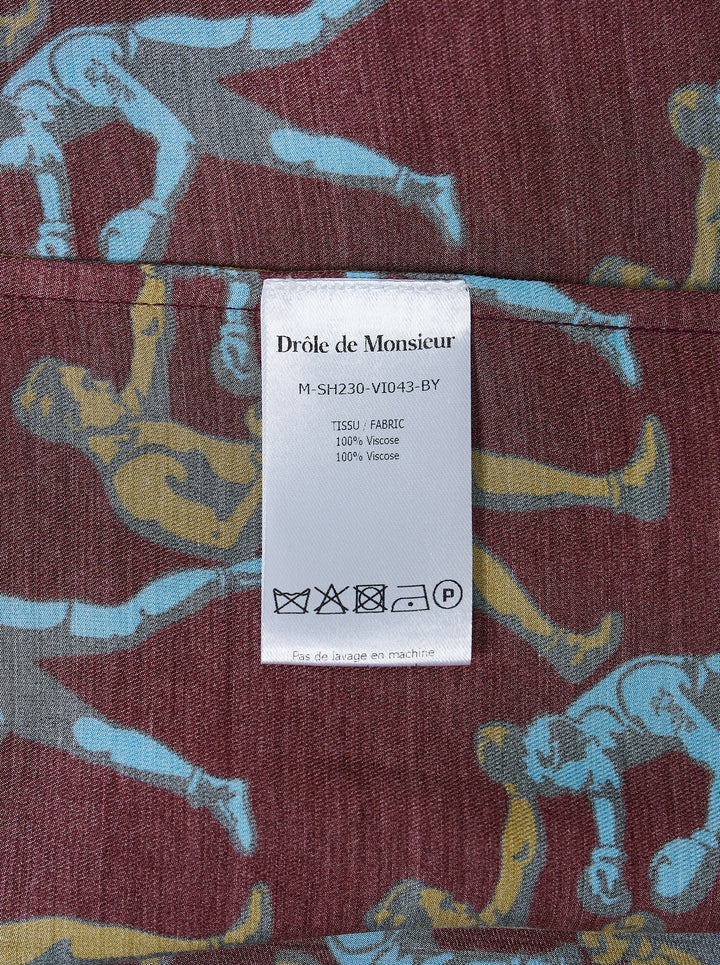 Drôle de Monsieur Notcha short sleeve shirt with an all-over vintage boxing print in blue and ochre on burgundy, featuring a camp collar and white buttons - view 3