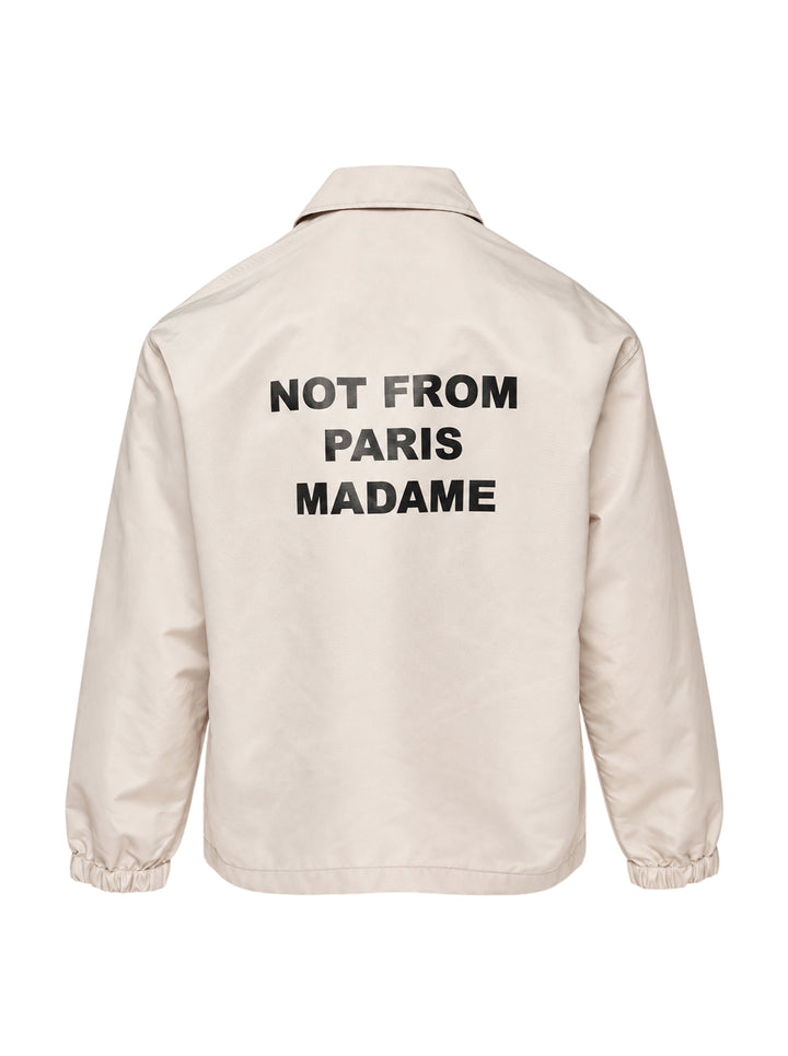 Drôle de Monsieur Not From Paris Madame slogan coach jacket in ecru with snap-button closure, point collar, elasticated cuffs, and embroidered chest slogan - view 2