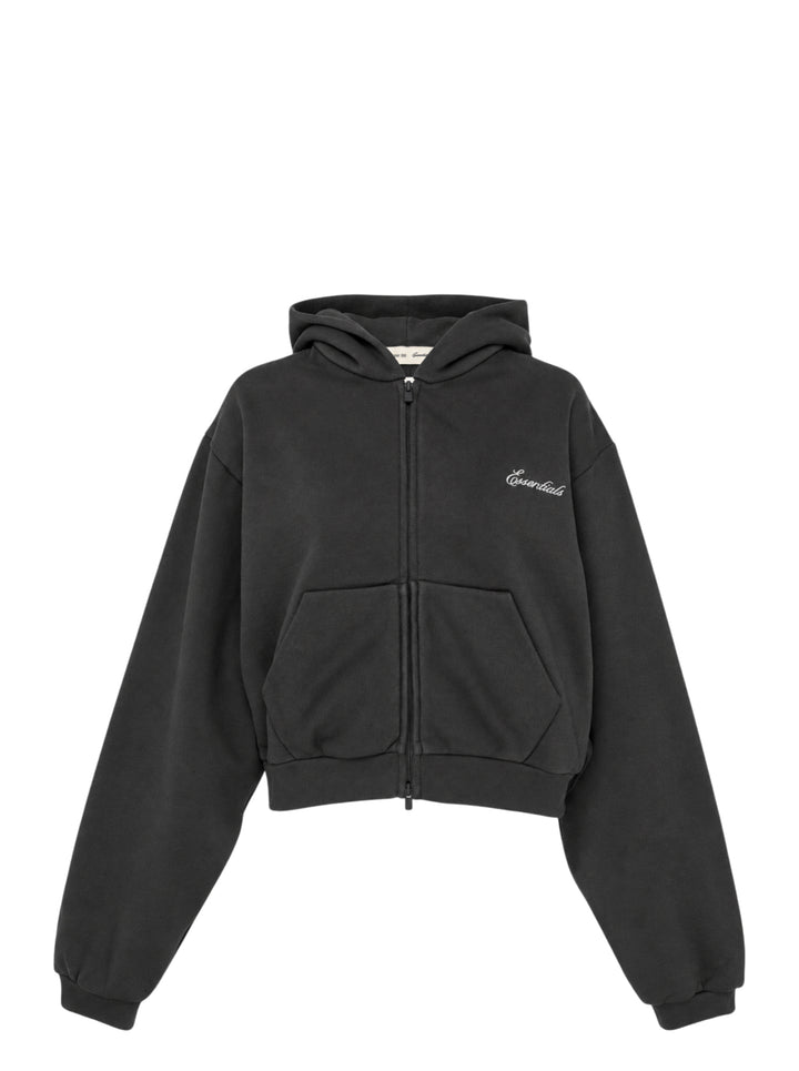 Fear of God Essentials women's modern cropped zip hoodie in washed black with embroidered script Essentials logo on the chest and front hand pockets