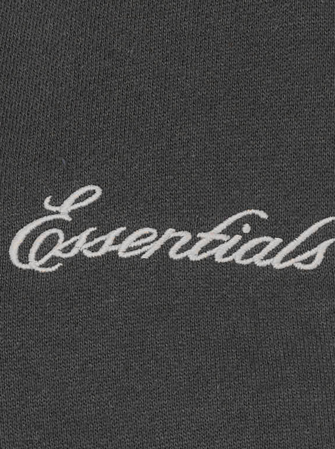 Fear of God Essentials women's modern cropped zip hoodie in washed black with embroidered script Essentials logo on the chest and front hand pockets - view 3