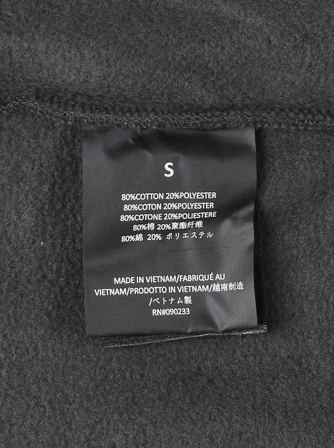 Fear of God Essentials women's modern cropped zip hoodie in washed black with embroidered script Essentials logo on the chest and front hand pockets - view 5