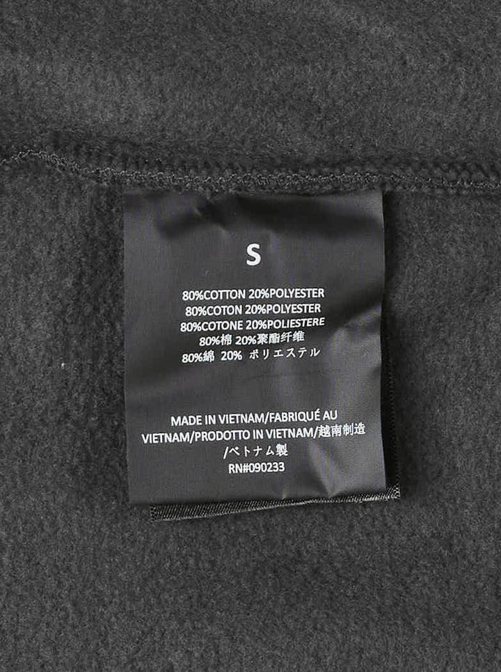 Fear of God Essentials women's modern cropped zip hoodie in washed black with embroidered script Essentials logo on the chest and front hand pockets - view 5