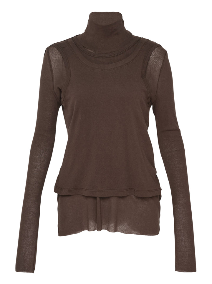 Melitta Baumeister Double Layer Turtleneck Top in dark brown, featuring a sheer long-sleeve base with ribbed turtleneck collar and an opaque sleeveless tank overlay with extended sheer hem