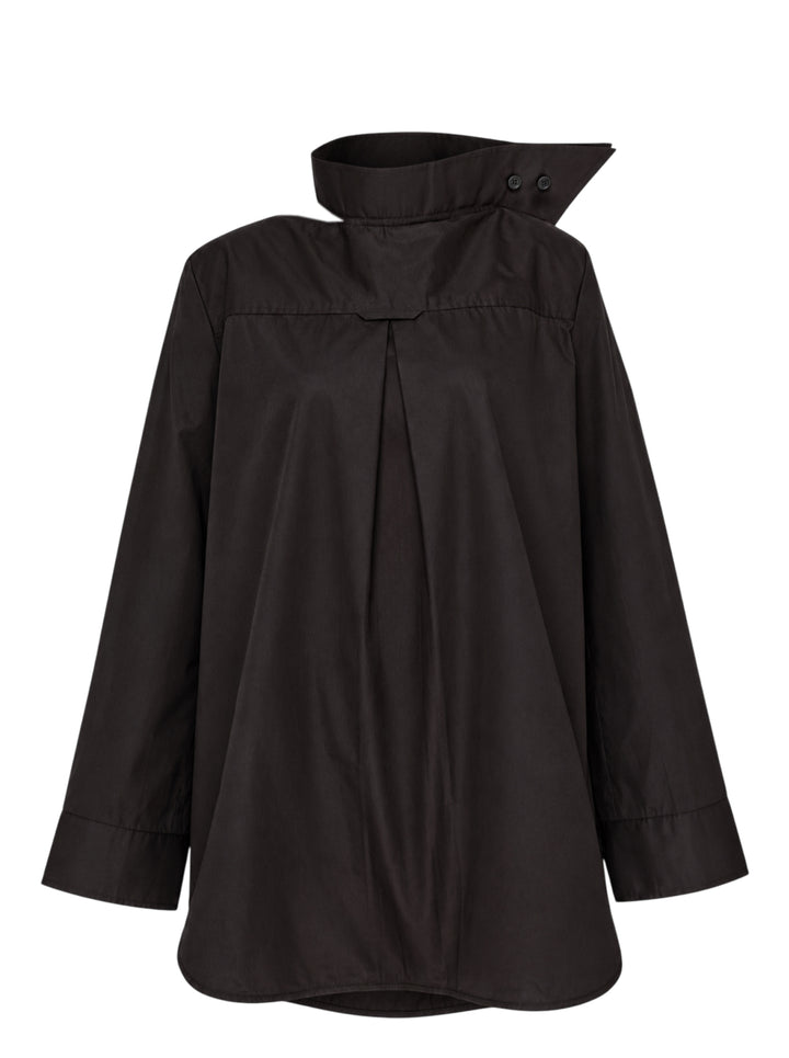 Melitta Baumeister black oversized cotton shirt with a sculptural asymmetric pointed collar, front box pleat and wide cuffs