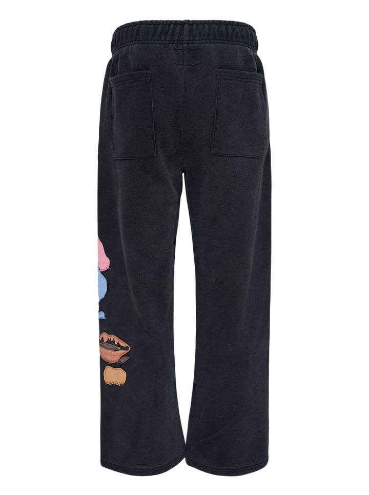 KidSuper Studios Side Eye Face washed black sweatpants with colourful patchwork appliqué face and drawstring waist - view 2