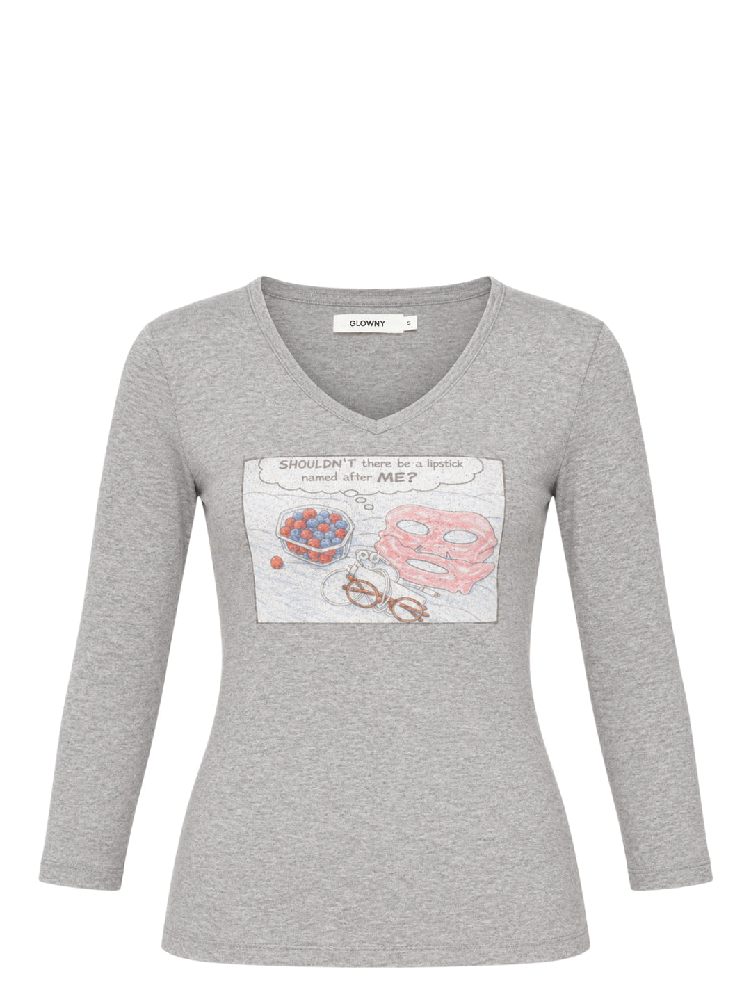Glowny Off Duty Girl heather grey V-neck three-quarter sleeve tee with a comic-strip graphic print featuring a pink face mask, a bowl of berries, spectacles, and the text 'SHOULDN'T there be a lipstick named after ME?'