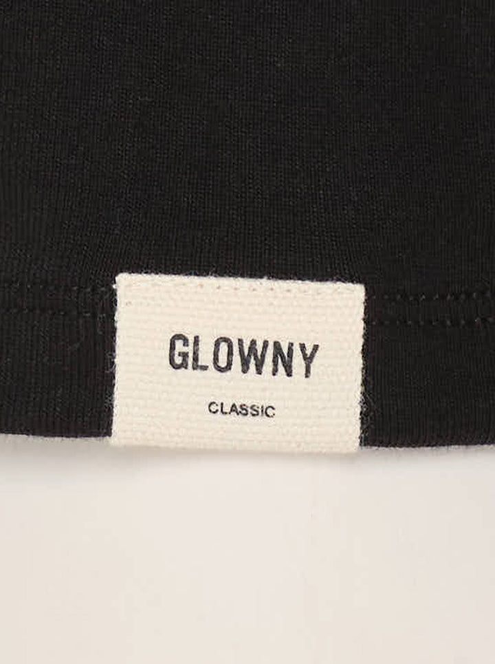 Glowny Long Sleeve Button Tee in black, featuring a short tonal button placket at the neckline, ribbed round collar, and a fitted jersey silhouette with woven brand label at the hem - view 5