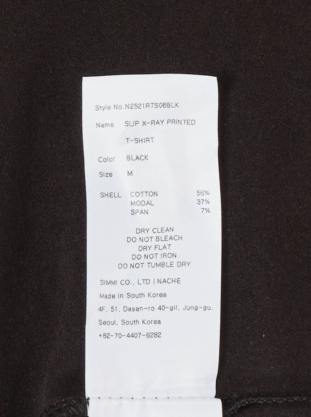 Nache black short-sleeve scoop-neck T-shirt with a distressed white X-ray slip dress print across the front - view 3