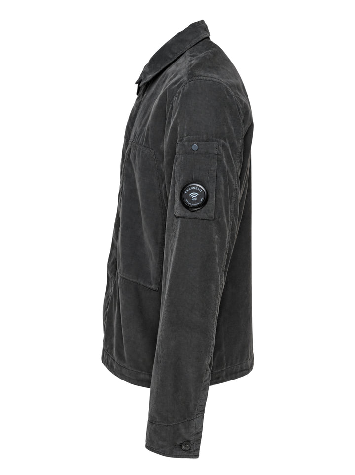 C.P. Company corduroy overshirt in washed charcoal with two large chest pockets and a Lens detail on the sleeve - view 3