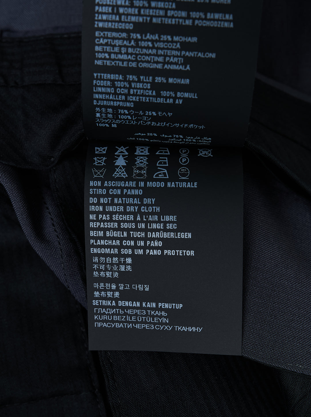Prada light mohair trousers in dark charcoal navy with straight leg, belt loops and concealed fly, shown from the front - view 3
