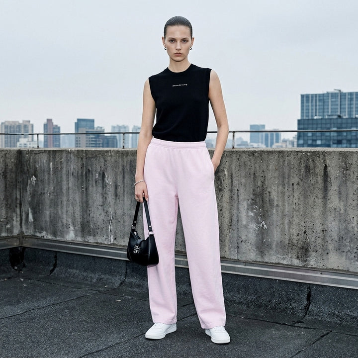 Alexander Wang Mid-Rise Relaxed Sweatpants in slate blue melange fleece with wide-leg silhouette, elasticated waistband, and subtle logo print at the hip - lifestyle
