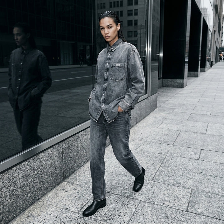 Alexander Wang oversized washed grey denim button-down shirt with shadow-print logo chest pocket and dropped shoulders - lifestyle