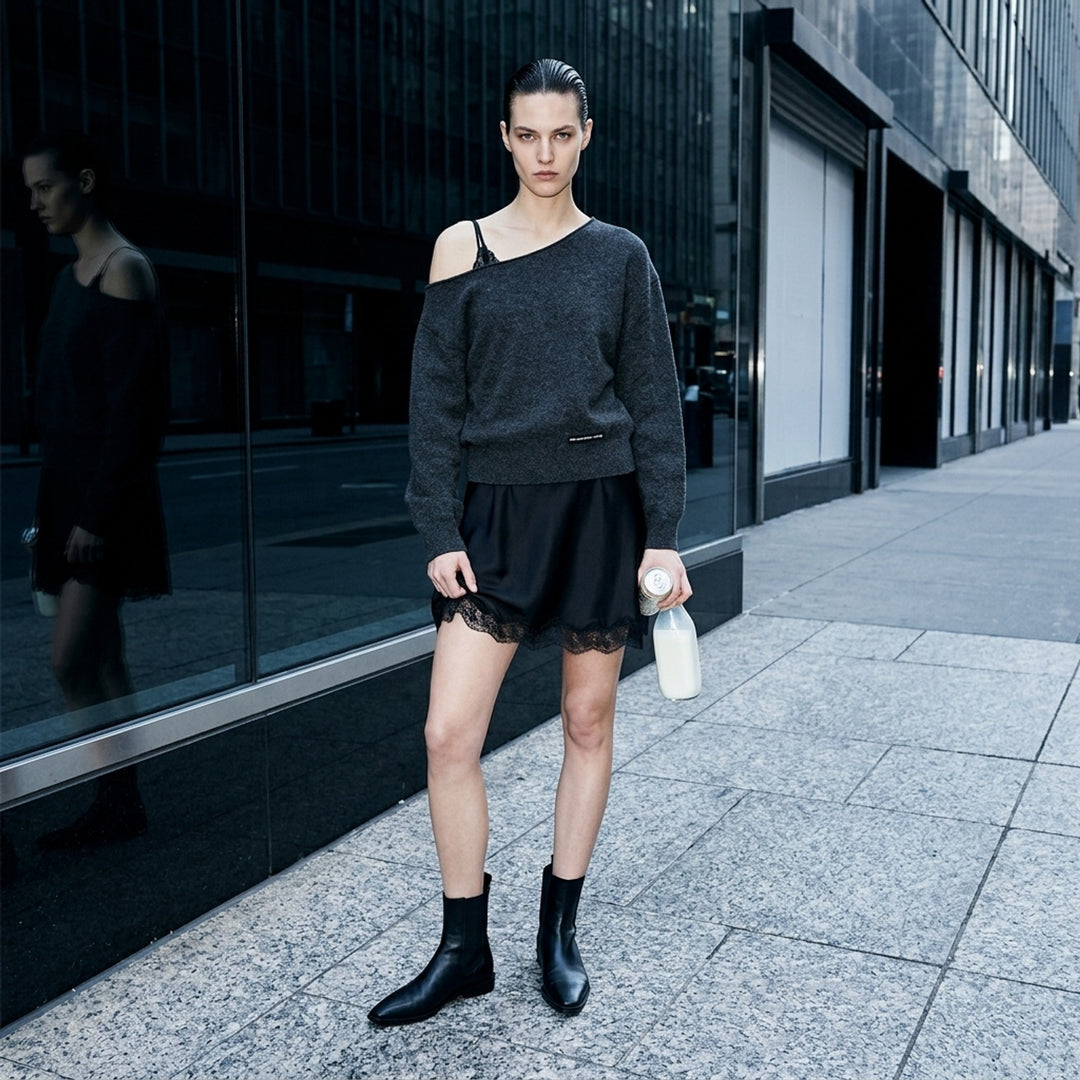 Alexander Wang pre-styled slip dress with off-shoulder charcoal knit sweater layered over a black satin slip with lace hem - lifestyle