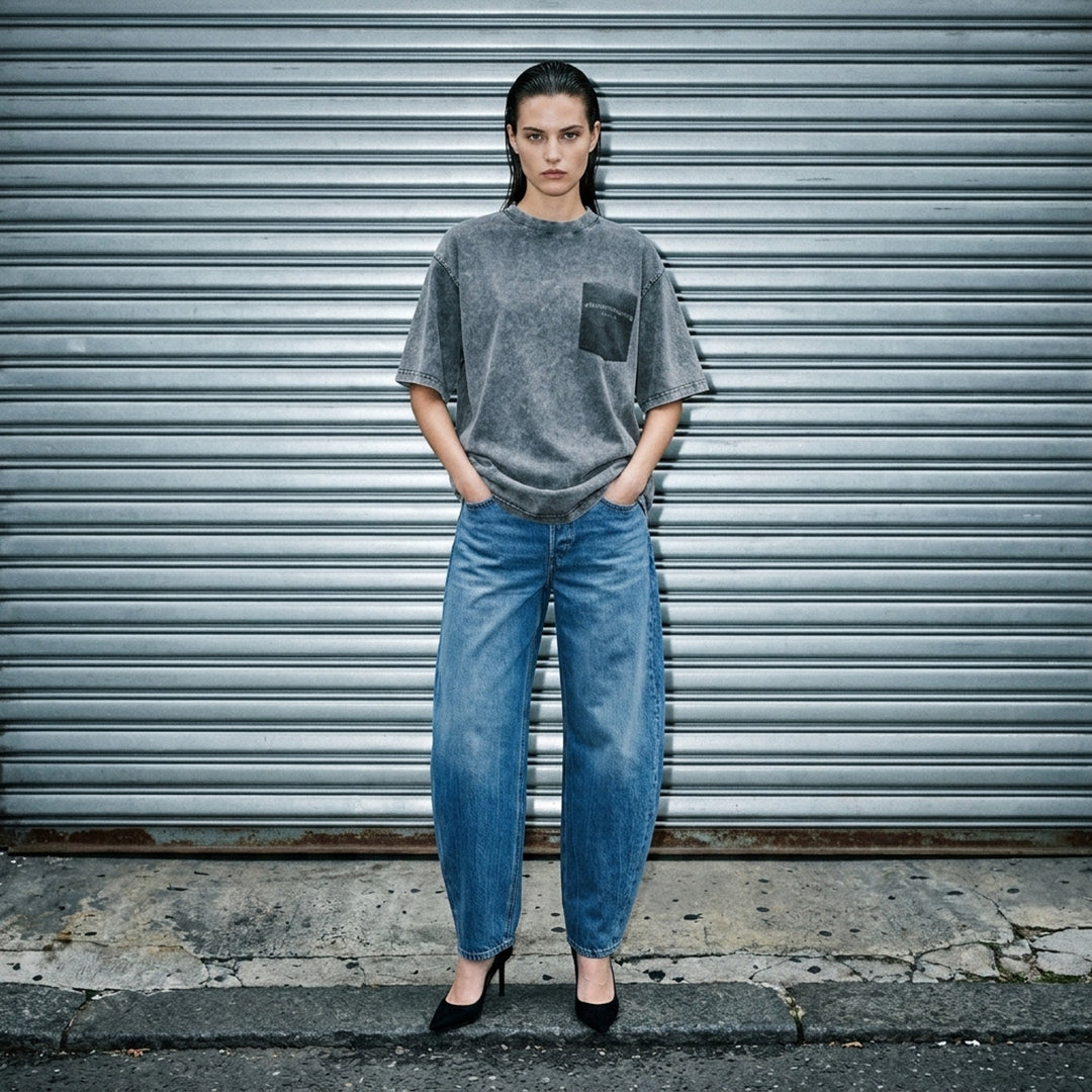 Alexander Wang short sleeve tee in washed grey with a printed shadow pocket and wordmark on the chest - lifestyle