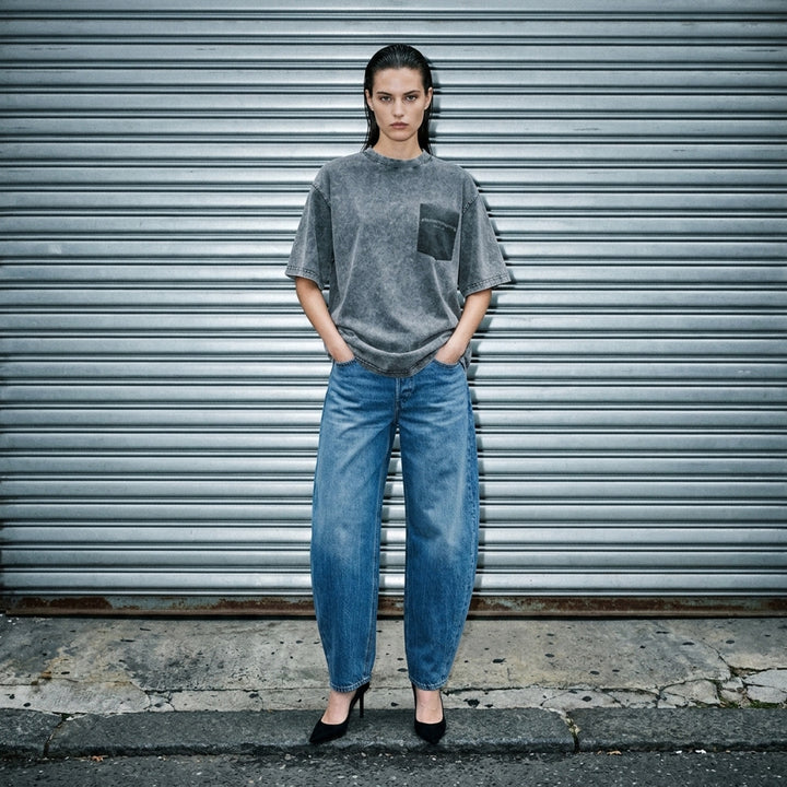 Alexander Wang short sleeve tee in washed grey with a printed shadow pocket and wordmark on the chest - lifestyle