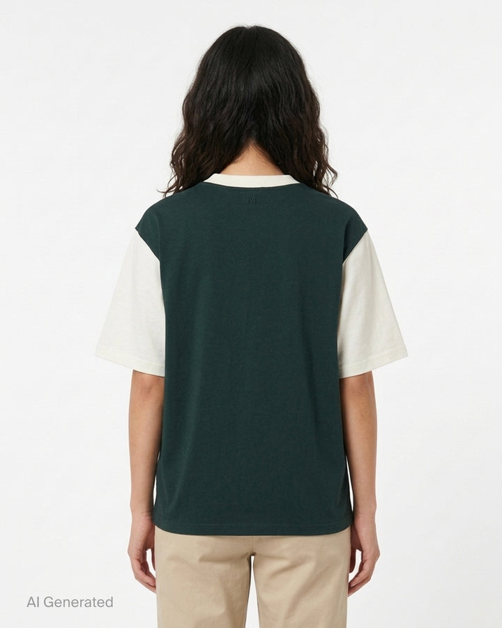 AMI Paris oversized t-shirt in dark green with cream contrast sleeves and collar, featuring white felt AMI PARIS lettering across the chest - back
