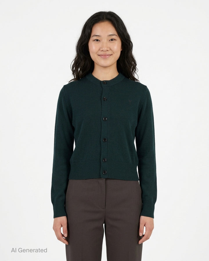 AMI Quota crewneck cardigan in deep forest green with black buttons, ribbed hem and cuffs, and a tonal embroidered heart logo on the chest - front