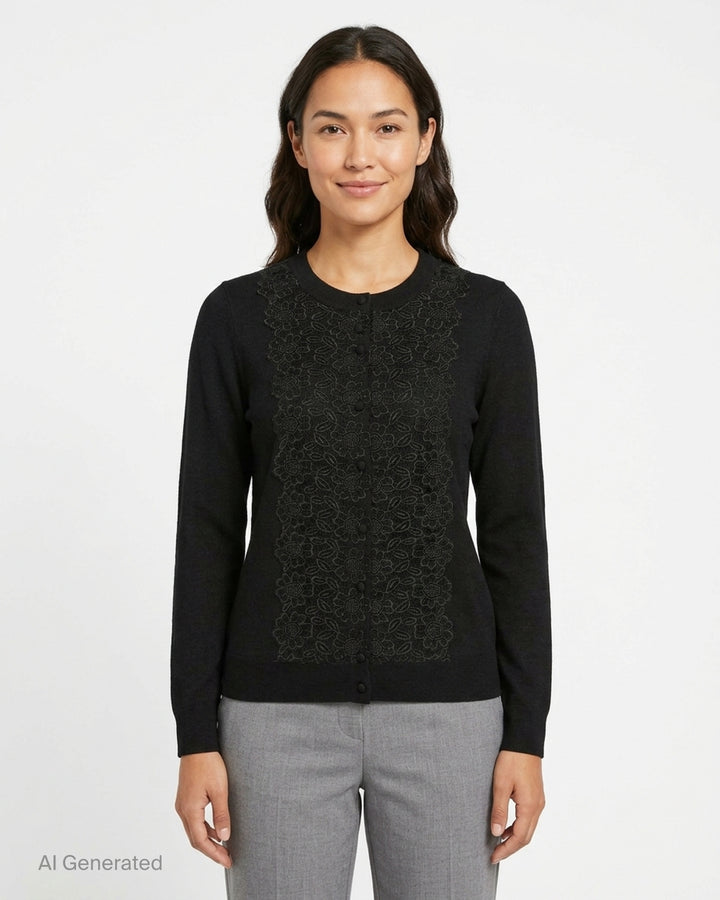 Carolina Herrera black knit cardigan with tonal floral lace centre front panel and covered button fastening, displayed on a flat lay against a white background - front