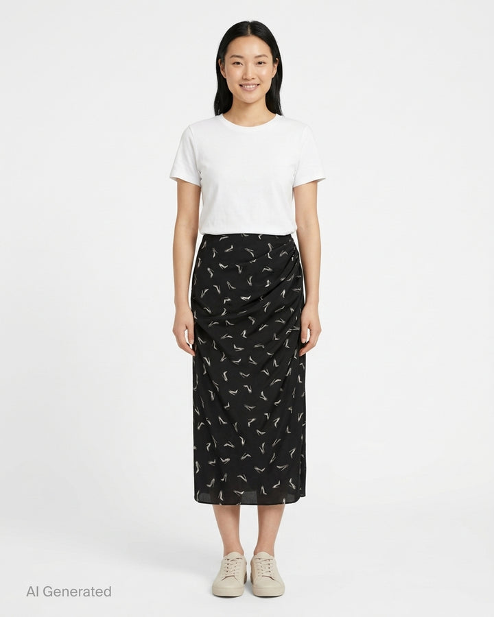 Carolina Herrera Good Girl Shoe Print Midi Skirt in black with white stiletto brushstroke print and draped ruching at the hip - front