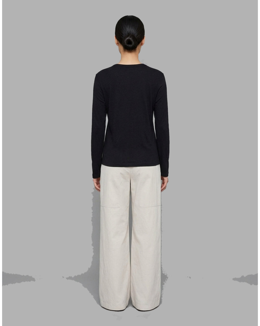 Black long sleeve cotton jersey Henley top with round neckline and five-button placket from Club21 Collection - back