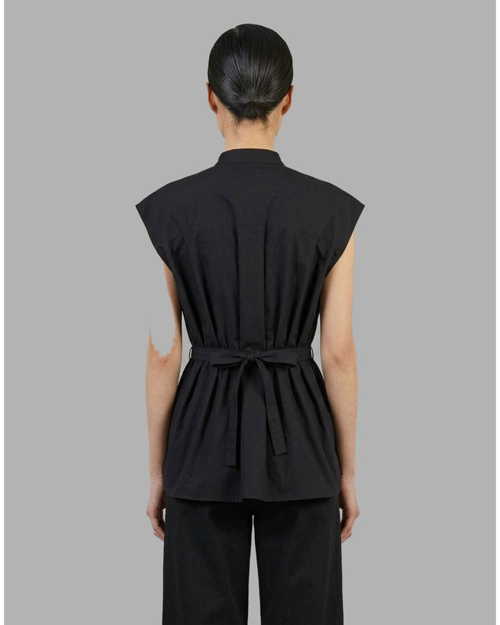 Black sleeveless cotton shirt with pintucked bib front, mandarin collar and self-fabric waist tie - back