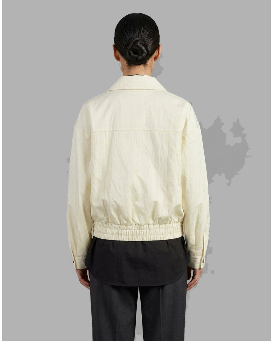 Cream cropped bomber jacket with stand collar, flap chest pockets, metal snap buttons and elasticated hem by Club21 Collection - back