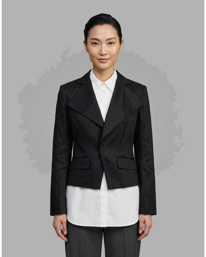 Black cropped blazer with wide notched lapels, flap pockets and a crinkled finish from Club21 Collection - front