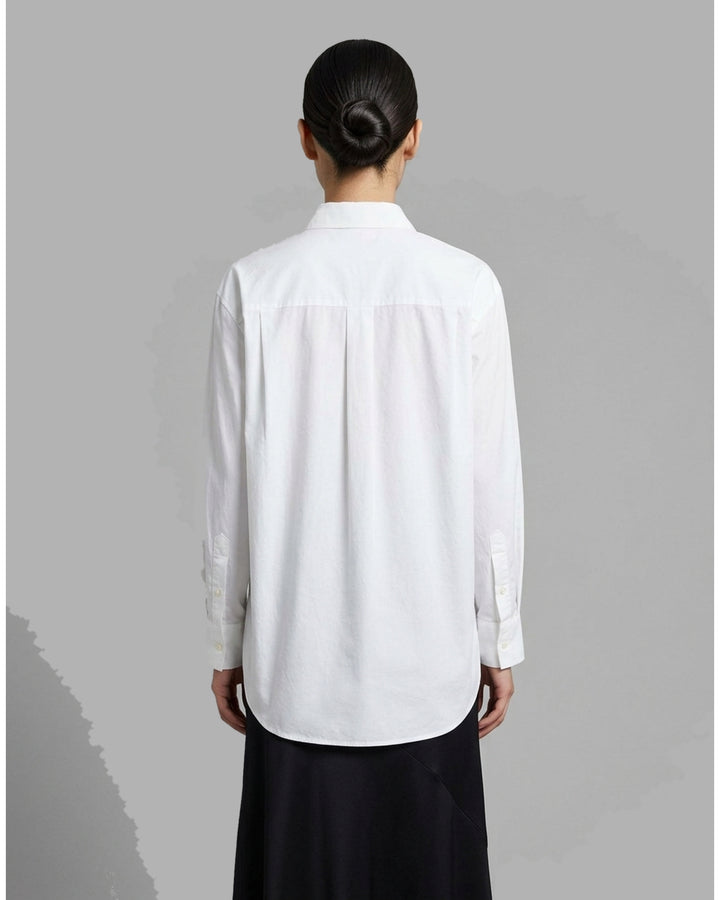 White structured cotton tuxedo shirt with pintucked bib front, pointed collar, concealed placket and long buttoned-cuff sleeves - back