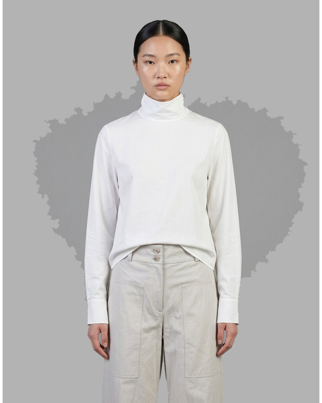 Black sheer silk cotton button-up shirt with stand collar and extended long sleeve cuffs, front view - front