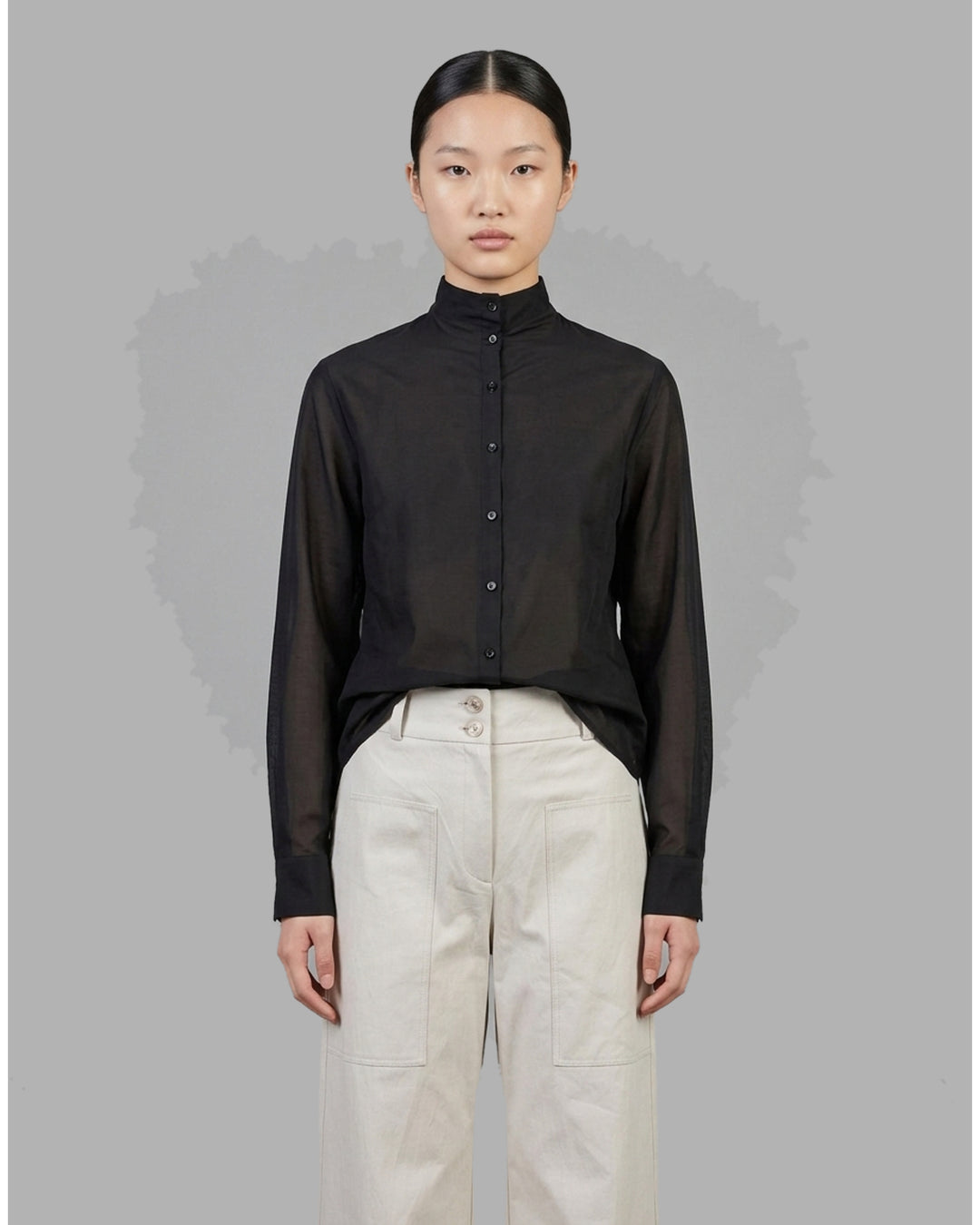 Black sheer silk cotton button-up shirt with stand collar and extended long sleeve cuffs, front view - front