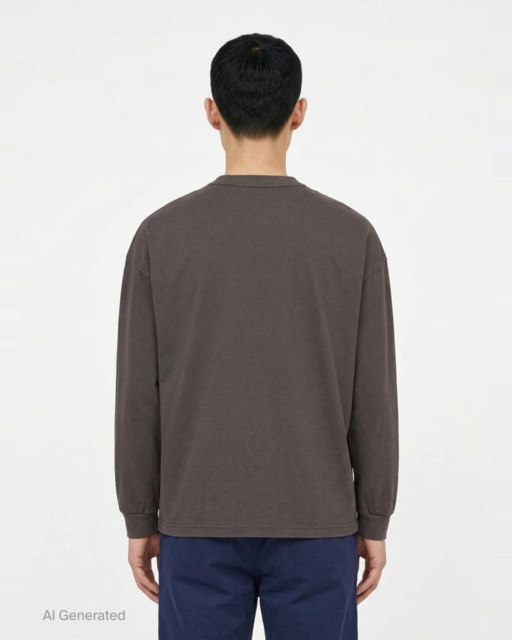 Comme des Garçons Homme slightly brushed cotton jersey long sleeve tee in taupe with crew neck, chest patch pocket, and ribbed cuffs - back