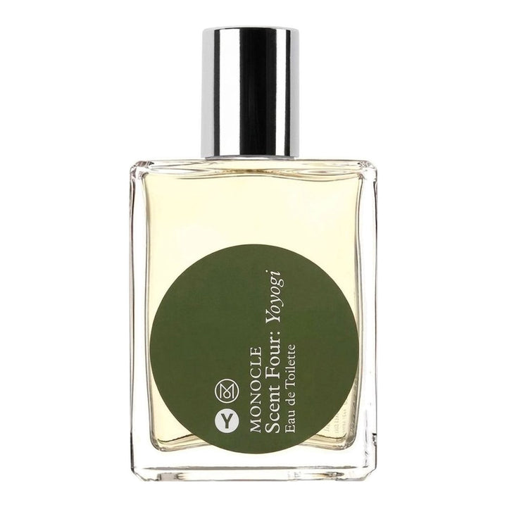 Comme des Garçons Parfums Monocle Scent Four Yoyogi Eau de Toilette 50ml spray bottle with polished silver cap and olive-green circular label on white background - packshot