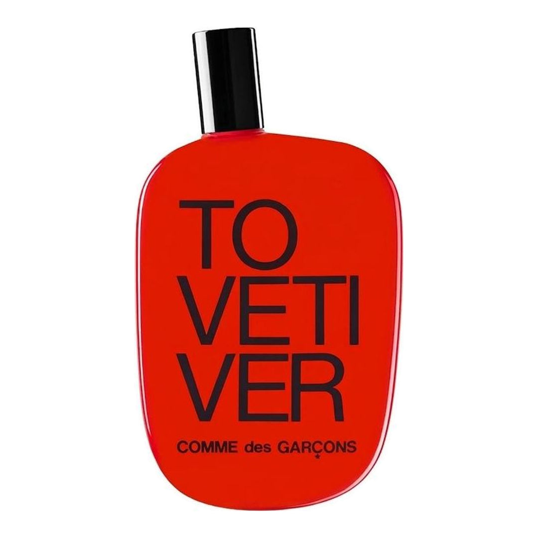 Comme des Garçons Tovetiver Eau de Parfum 100ml in a glossy red pebble-shaped bottle with black cap and bold black lettering - packshot
