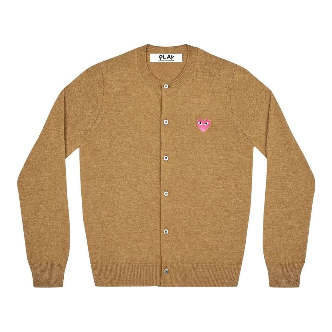 Comme des Garçons PLAY black round neck cardigan with embroidered pink heart emblem patch and button-through front fastening, flat lay view - packshot