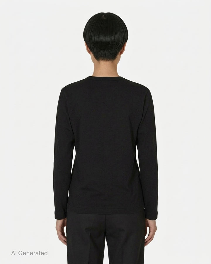 Black long sleeve crew neck tee with a stacked double red heart embroidered patch on the chest and a white PLAY Comme des Garçons neck label - back
