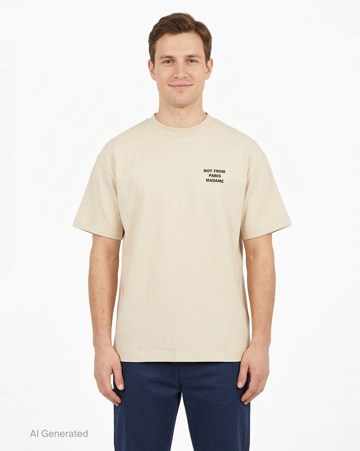 Drôle de Monsieur Not From Paris Madame slogan tee in cream with bold black chest text print, boxy fit, crew neck - front