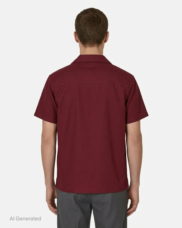 Drôle de Monsieur burgundy short sleeve camp collar shirt with white embroidered illustration of three women at a roulette table - back