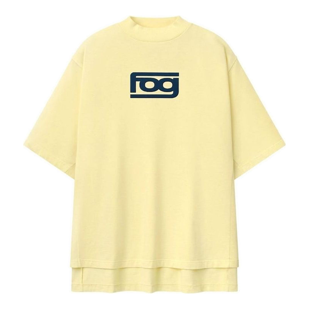 Fear of God ESSENTIALS Panelled Modern Tee in deep teal with a yellow logo graphic at the chest, shown from the front - packshot
