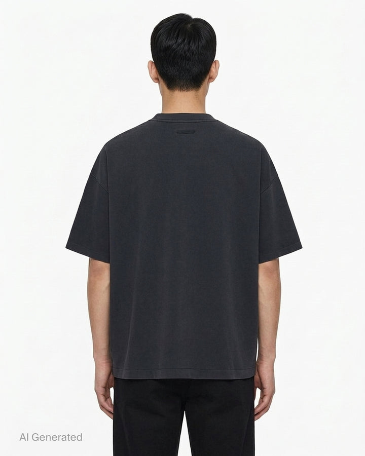 Fear of God Essentials Signature 90's Short Sleeve Tee in washed charcoal with oversized boxy fit and tonal embroidered script logo on the chest - back