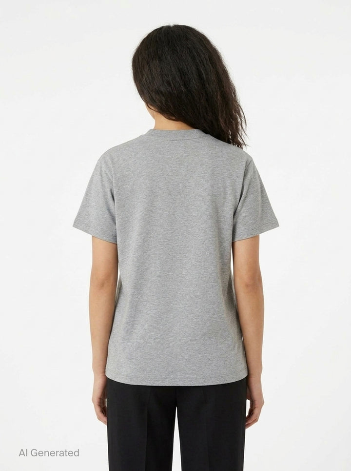 Ganni relaxed graphic cotton tee in heathered grey with orange flame-style Ganni logo, illustrated teddy bear holding a Ganni sign, pine forest motif, and 'Have a nice day! Please recycle' text on the front - back
